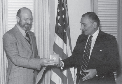 Walt Lomac is finally recognized for his stand in the Polyakov case in a 1979 medal presentation ceremony. George Kalaris, Chief of the Counterintelligence Staff 1974-76 and Chief of SE Division 1976-79, is the presenter. (Courtesy of Walter Lomac)