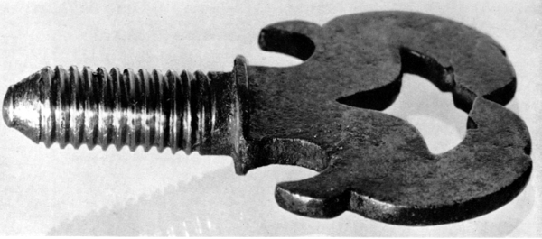 Figure 8.—Binding screw seen at A in figure 3, showing the long smooth fadeout of the thread below the shoulder. (Smithsonian photo 49276.)