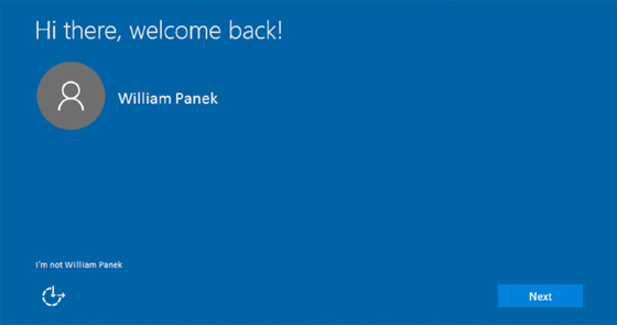 Screenshot shows the message Hi there, welcome back and profile name William Panek on top left, option I am not William Panek on bottom left and Next button on bottom right.