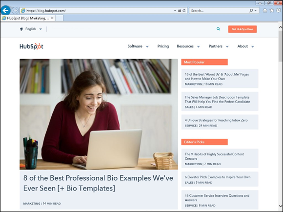 Screenshot of Home page of HubSpot blog, with an image of a lady operating a laptop on the left side and the key features of the blog on the right side.