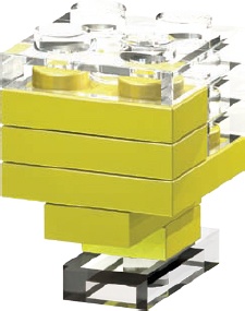 The solid yellow elements represent the character’s face; the clear elements represent his hair or hat, and perhaps neck. Use different colors of plates to create realistic skin tones for your miniland folk.