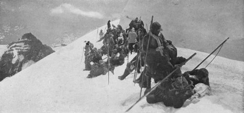 The Mountaineers lunching in a crevasse on White Glacier.