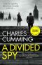 A Divided Spy (Thomas Kell Spy Thriller, Book 3)