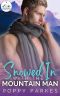 Snowed In With the Mountain Man: A Forced Proximity Steamy Instalove Romance (The Mountain Men of Heartwood Book 2)