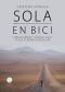 Sola en bici